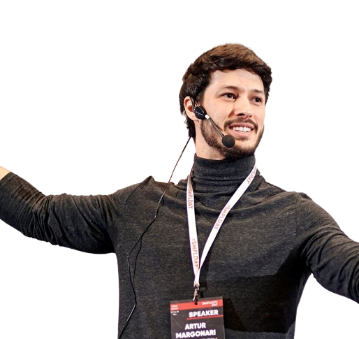 Artur Margonari speaking on stage